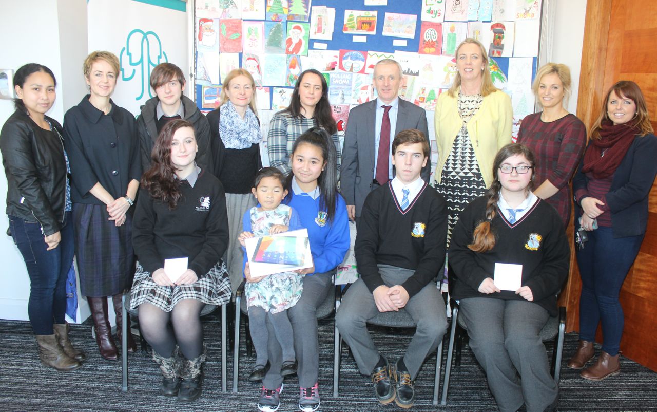 The winners and runners-up in the Kerry ETB Christmas Card Competition. In front; Hazel Riordan, Killarney Community College, Jeannie Bobiles (with her sister Jillian), Castleisland Community College, Christobel Montes, Coláiste Na Ríochta and Amelia Ginisole Coláiste Na Ríochta. Also included at back are, from left; Teresita Bobiles, Carmel Kelly, Principal of Castleisland Community College;  Sasha Furlong, Killarney Community College; Eva Enright, Deputy Principal Coláiste Na Ríochta; Michelle O'Mahony, art teacher at Killarney Community College; Colm McEvoy, CEO of Kerry ETB; Teresa Longergan, Deputy Principal of Castleisland Community College; Pia Thornton art teacher Castleisland Community College and Marian Sugrue, art teacher at Coláiste Na Ríochta. Photo by Dermot Crean