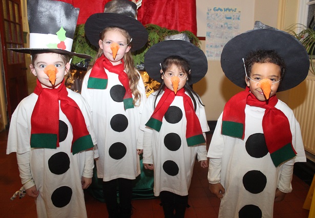 Performing in the Presentation Primary School Christmas Concert were, from left: Kayleigh Cummane, Kaydence O'Mahony, Betty Libutlibut, Layla Mitchell. Photo by Gavin O'Connor. 