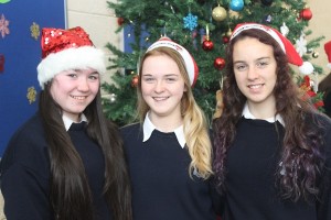 Kathlyn Galvin, Andrea O'Callaghan and Lauren Foley at the Presentation Secondary School Santa Hat Day in aid of Ronald McDonald House. Photo by Gavin O'Connor. 