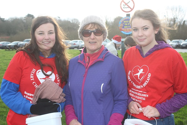 At the Santa Run which began ended at The Wetlands were, from left: Mikaela Chester, Katrina Chester and Maeve Buckley. Photo by Gavin O'Connor. 