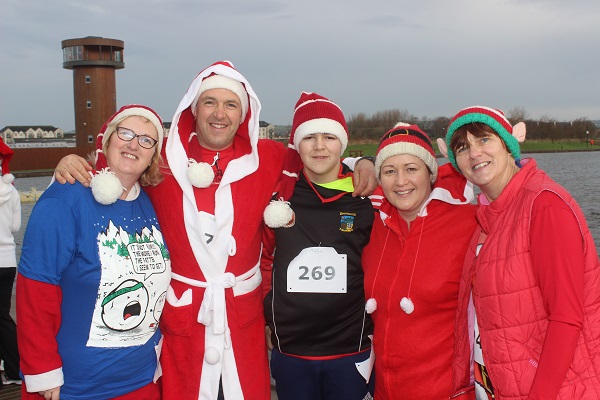 At the Santa Run which began ended at The Wetlands were, from left: Trish Horan, Brian Kennedy, Eoin Kennedy, Denise Kennedy and Breda Quirke. Photo by Gavin O'Connor.