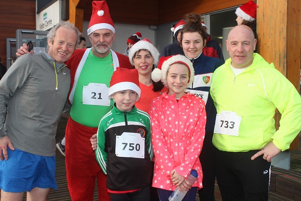 At the Santa Run which began ended at The Wetlands were, from left, in front: Ronan Kelly and Muirin Finn. Back: Frank O'Connor, Tom Brown, Mary Kelly, Ciara Finn and Brendan Kelly. Photo by Gavin O'Connor.