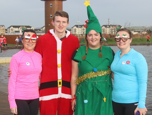 At the Santa Run which began ended at The Wetlands were, from left: Amy Stone, David O'Shea, Aoife Griffin, Maeve Gleeson. Photo by Gavin O'Connor.