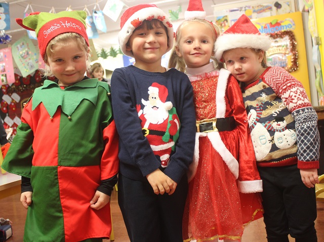 Pupils taking part in the Scoil Eoin Balloonagh Christmas Concert were, from left: Lillie Evans, Ben Jorgi, Roisin Sheehy and Clodagh O'Sullivan. Photo by Gavin O'Connor. 