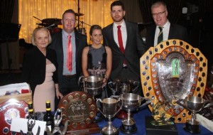 Chairwoman of Austin Stacks Ladies Club Noreen Power, senior hurling team captain Danny Maguire, senior ladies team captain Karena Slattery, senior football captain in 2014 Barry Shanahan and Chairman of Austin Stacks GAA Club Liam Lynch in front of silverware won by the teams in the past year at the Austin Stacks GAA Social in the Ballyroe Heights Hotel on Saturday night. Photo by Dermot Crean