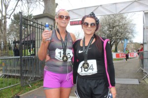 Cindy O'Shea and Sabrina Caffrey at the marathon finishing line on Saturday afternoon. Photo by Dermot Crean