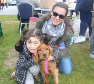 Jennifer O'Carroll with Hannah Reidy and 'Molly' at the Dog Show in aid of the Irish Guide Dogs Association at the John Mitchels GAA grounds on Saturday. Photo by Dermot Crean