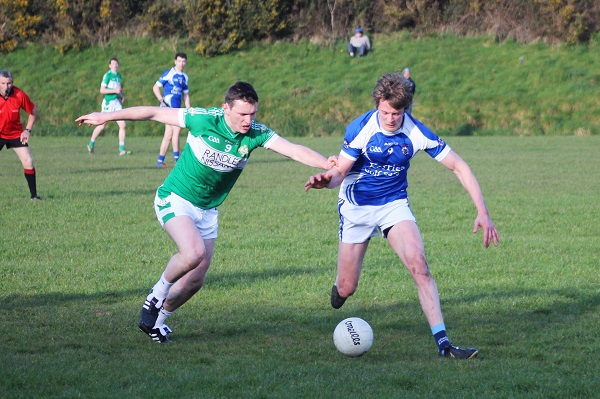 John C O'Connor tussling for possesion with Legion's Shaun Keane. Photo by Gavin O'Connor. 