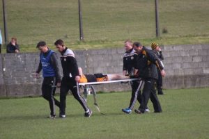Greg Horan being stretchered off during the Austin Stacks v Dingle match in Annascaul on Saturday evening. Photo by Dermot Crean