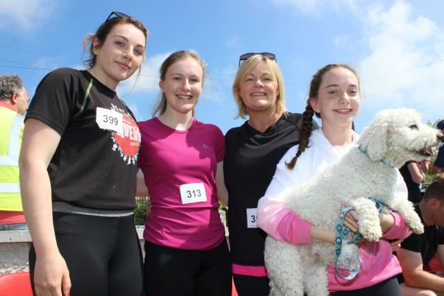 Caoimhe Hanafin, Ellie Stuart, Siobhan Stuart and Kate Hennessy and Zac the dog at the Spa NS family day in memory of Donal Walsh on Sunday. Photo by Dermot Crean