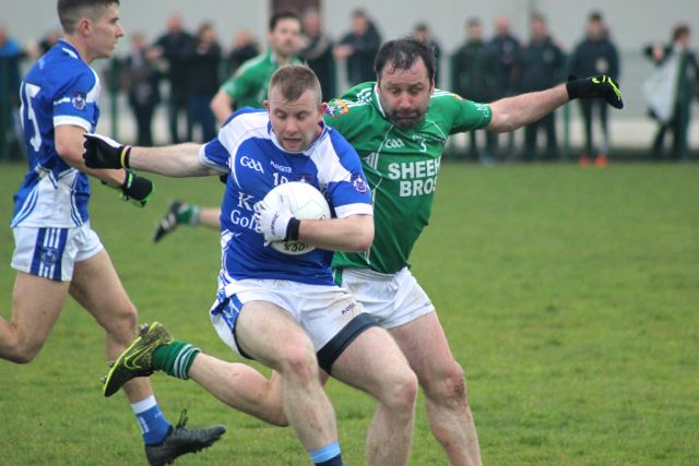 Damian Murphy tackles David McLaughlin during the Kerins O'Rahillys v Milltown/Castlemaine match on Sunday. Photo by Dermot Crean