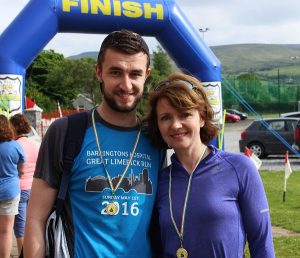 Conor McElligott and Avril Hewigg at the Dingle Way Challenge finishing line. Photo by Gavin O'Connor.