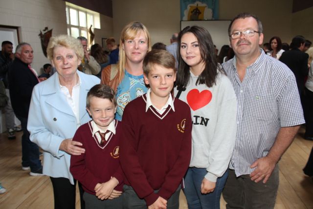 In front; Kyle and Dylan McKenna. Back from left; Mary, Caroline and Shelley McKenna and Paul Clapham at the Holy Family NS sixth class graduation at Our Lady and St Brendan's Church on Tuesday night. Photo by Dermot Crean