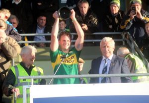 Kerry junior captain, Paul O'Donoghue, lifts the Munster Cup. Photo by Dermot Crean.