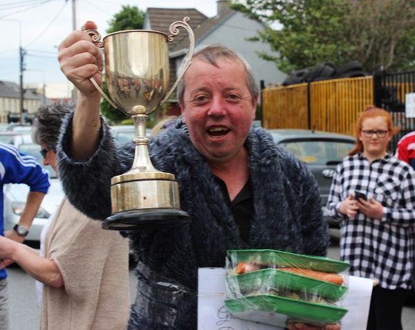 The champ Dominic O'Brien with the One Furlong Dash Perpetual Trophy and his dinner for two. Photo by Gavin O'Connor. 