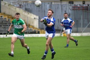 Barry John Keane lays off a pass as James O'Donoghue looks on in the Killarney Legion v Kerins O'Rahillys game on Sunday. Photo by Dermot Crean