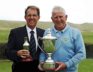 Michael Mercer, left, Captain of Castlegregory Golf Club presenting his captain's prize to overall winner Tommy King at Castlegregory Golf Club.