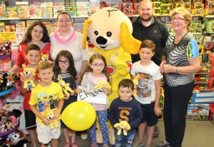 At the presentation of donations to Erin's Fund at Caballs Toymaster, Tralee were in front; Ruairi O'Flaherty, Alex O'Flaherty, Megan O'Sullivan, Erin O'Sullivan, Jack McElligott and Adam O'Flaherty. Back; Louise O'Sullivan, caroline O'Sullivan, Toby from Toymaster, Paul O'Sullivan and Ann Laide of Caballs Toymaster. Photo by Dermot Crean