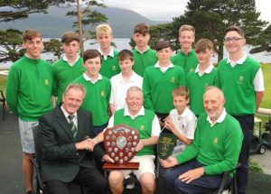 Jack Buckley, Captain of the  Federation of Co.Kerry Golf Clubs, presents the winning trophy to Tralee Golf Club team manager Gatt Carey following Tralee's win in the Kerry Junior League competition at Killarney Golf and Fishing Club.  Also seated are Mark Gazi and  Liam Nolan, Tralee Golf Club Captain. Standing from left are Cian Hill, Michael O'Gara, Mark Stephenson, Eoin Lynch, James McCarthy, Ciaran Nolan-Tighe, Evan O'Connor, John Holmes, Mark Leahy and David Nolan-Tighe.  Picture: Eamonn Keogh