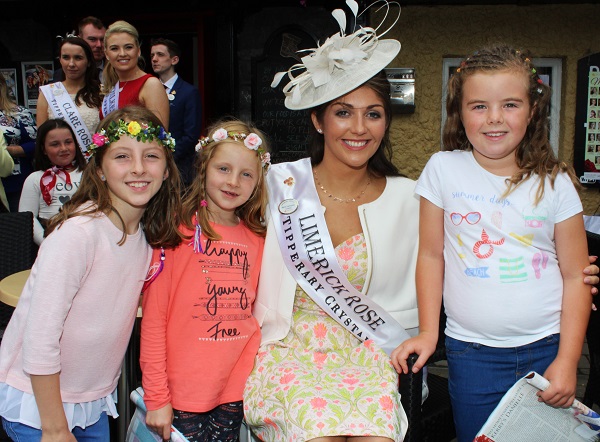 Maya O'Keeffe, Maedhbh O'Keeffe and Eimer Cummins with Limerick Rose, Marie Hennessy. Photo by Gavin O'Connor. 