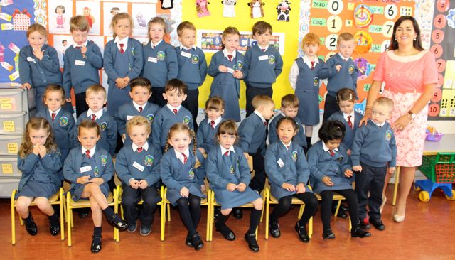 Mrs Carol Anne O'Donoghue's Junior Infants class at their first day in Scoil Eoin, Balloonagh on Wednesday morning. Photo by Dermot Crean