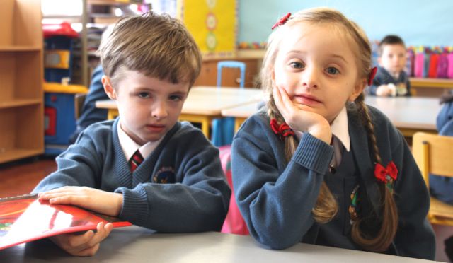 Darragh and Clodagh Kennedy at their first day in Scoil Eoin, Balloonagh on Wednesday morning. Photo by Dermot Crean