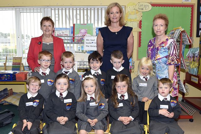 Photo by James McCarthy Digimac Photography Fenit Pictured are Juniors Infants from St Brendans NS ,on their first day at school with principal Aisling O'Sullivan, Val Caplan and Maura Gaynor. Photo by Jim McCarthy Digimac Photography 
