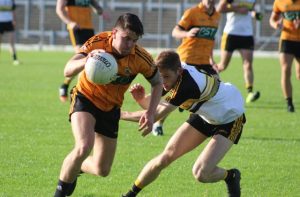 David Mannix goes past Gavin White of Dr Crokes in the senior club final earlier this month. Photo by Dermot Crean