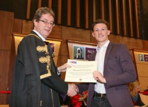 0564: Pictured receiving an Excellence Scholarship scroll and a cheque for Ä1,500 from NUI Galway President, Dr Jim Browne, is Donagh ” Buachalla from Clahane, Co. Kerry. Donagh is now studying Engineering at NUI Galway.