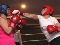 Caroline Harrington about to receive one on the nose from Nicole Treanor at the Boxing Night in aid of Recovery Haven on Saturday night. Photo by Dermot Crean
