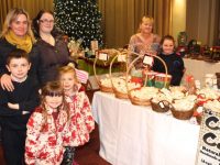 Lorraine McCarthy and Aoife McCarthy with Brendan McCarthy, Abbie McCarthy and Katie Moynihan at Country Candles stand manned by Ann Griffin and Katie Sheahan at the Recovery Haven Craft Fair in the Manor West Hotel on Thursday. Photo by Dermot Crean
