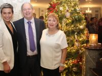 Maria Walsh with the hosts, Dick and Eibhlin Henggeler at the Thanksgiving Dinner at the Rose Hotel on Thursday evening. Photo by Dermot Crean