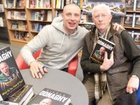 Brian Caball gets his copy of 'What Do You Think Of That?' signed by Kieran Donaghy at O'Mahony's Bookshop on Saturday. Photo by Dermot Crean
