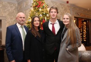 All-Ireland Junior medal winner John C O'Connor of Kerins O'Rahillys with family Frank, Maria and Anna at the Rose Hotel on Saturday night. Photo by Dermot Crean