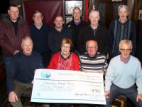 At the presentation of a cheque for €4,300 from the Greyhound Bar Golf Society to Recovery Haven were, front from left; Mervyn Griffin, Maureen O'Brien of Recovery Haven, John O'Connell and Aidan O'Connor. Back from left; Colm Sheehy, Francie Roche, Timmy Barrett, Phil Murphy, Richard Barry and Eddie Wall. Photo by Dermot Crean