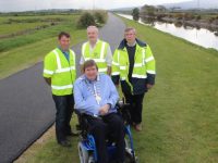 Mayor of Tralee, Cllr Terry O'Brien with Sean O'Keeffe, Frank Hartnett and Murty Quirke of Kerry County Council at the resurfaced walkway near the Lock Gates on Wednesday morning. Photo by Dermot Crean