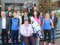 At the launch of the Rose of Tralee 10k at the Rose Hotel on Friday evening were, in front; Chairman of Tralee Harriers Martin Fitzgerald, Derek Griffin, Mayor of Tralee Terry O'Brien, Kerry Rose Breda O'Mahony, and Michelle Greaney. Back from left; Race Director Martin O'Sullivan, Alanna O'Sullivan, Grace Creedon, Mary Fitzmaurice, General Manager of The Rose Hotel Mark Sullivan, Emer Hogan and Vice-Chairman Gene O'Donnell. Photo by Dermot Crean