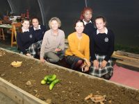 Teachers Rita O'Donoghue and Clem O'Keeffe with students Laura Scanlon, Doireann Thomas, Marie Blanche and Aisling O'Connell in the polytunnel at the Presentation Secondary School Open Night on Wednesday. Photo by Dermot Crean