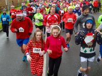Participants take off on the Santa 5k Fun Run from the Tralee Bay Wetlands on Sunday morning. Photo by Dermot Crean