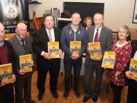 The team behind 'A Centenary History of Austin Stacks GAA Club' at its launch in the clubhouse at Connolly Park on Friday night. From left; Tadhg McMahon, Martin Collins, Eddie Barrett, Seamus Smith, Billy Ryle, Adrienne McLoughlin and Tim Slattery. Photo by Dermot Crean