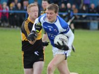 Colm Cooper tackles John C O'Connor in the Kerins O'Rahillys v Dr Crokes match on Sunday in Strand Road. Photo by Dermot Crean