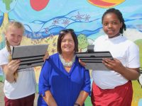 Margaret Kissane of Connect Kerry with Moyderwell Mercy Primary  pupils at the presentation of the tablets on Thursday. Photo by Dermot Crean