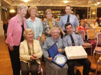 Mary O'Brien with a special token to mark her 90th birthday with, at back; Mairead Fernane, Katie Bolger, Josephine Griffin and Garda Irene O'Riordan. In front is Una Buckley and Garda Aidan O'Mahony at the Tralee Tidy Towns Awards at The Rose Hotel on Tuesday night. Photo by Dermot Crean