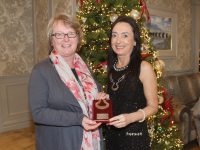 Helen O'Carroll (left) receives the Kerry Heritage Award 2018, from Marie O’Sullivan, President, Kerry Archaeological and Historical Society, at the society’s annual lunch in the Rose Hotel, Tralee, on Sunday. Photo by Dermot Crean