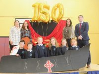 Teachers Mary Slattery, Michelle Broderick, Andrea Brosnan and Principal Barry O'Leary with pupils at the O'Brennan NS 150th celebrations on Friday morning. Photo by Dermot Crean