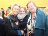 Young Siún O'Connor with mom Carol and grandmother Catherine Myers at the Caherleaheen NS Grandparents Day on Friday. Photo by Dermot Crean