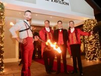 Circus artist Judenald Marcus Penders with Ballygarry's Thys Vogels, Tadhg McGillicuddy and Padraig McGillicuddy welcoming  guests to the Ballygarry House Hotel 'Greatest Showman' themed Christmas Party Night on Friday. Photo by Dermot Crean