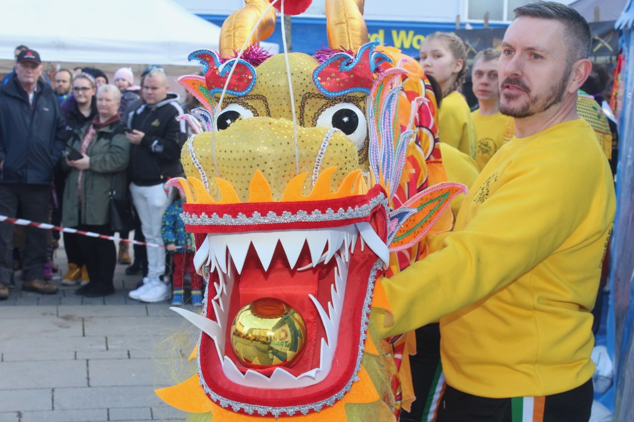 PHOTOS: Lions And Dragons Bring Colour To The Square