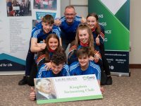 Ger McDonnell and members of Kingdom Swimming Club at Cara Credit Union.