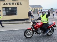 Elaine McGillicuddy heading off on the West Kerry Honda 50 and Classic Bike Run charity event from Blennerville Windmill on Sunday. Photo by